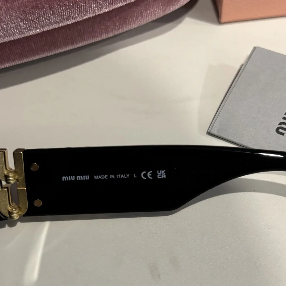 MIUMIU. miu glossy